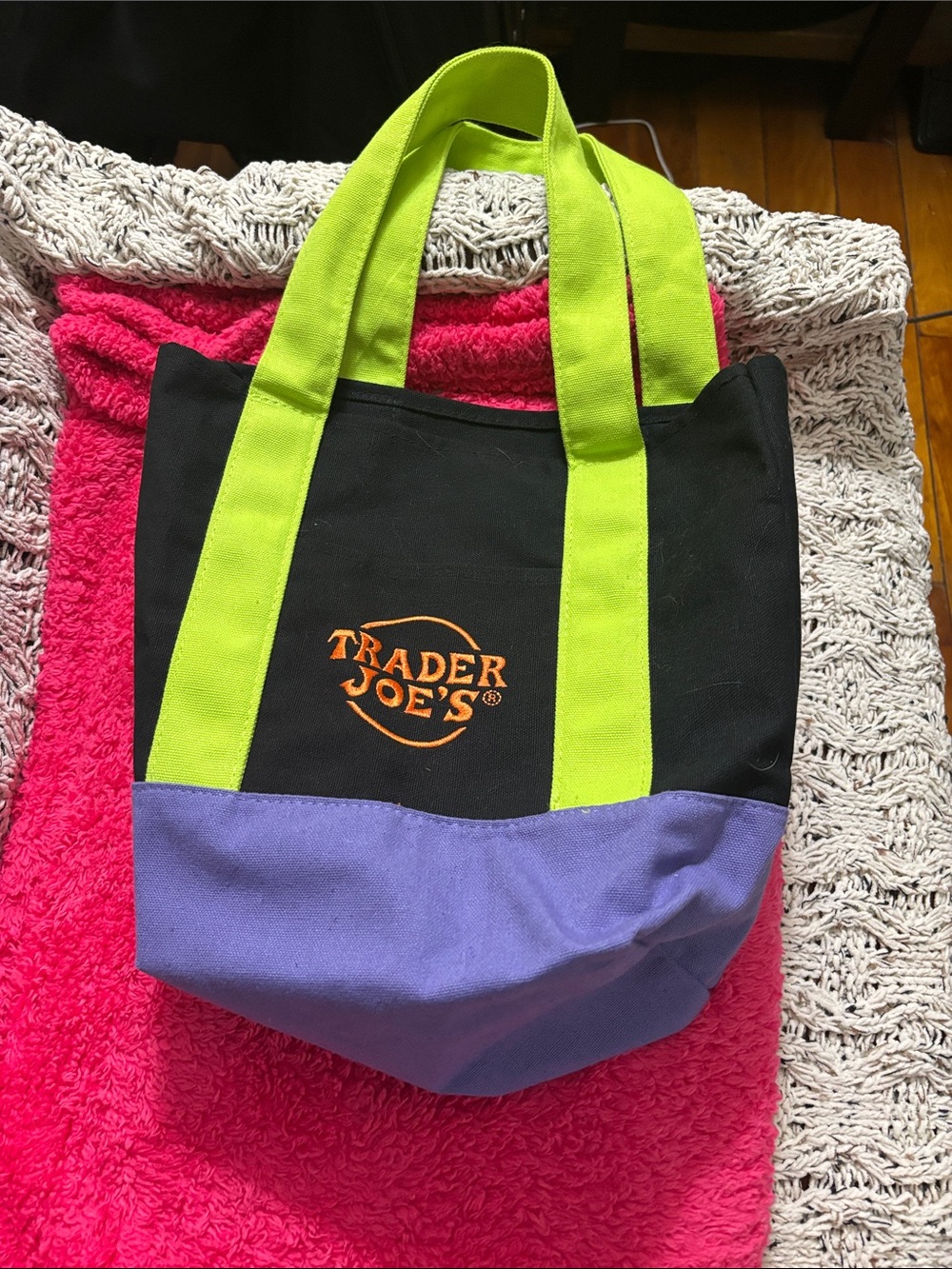 Limited edition Trader Joes Black Canvas Tote with Lime Handles and purple Base